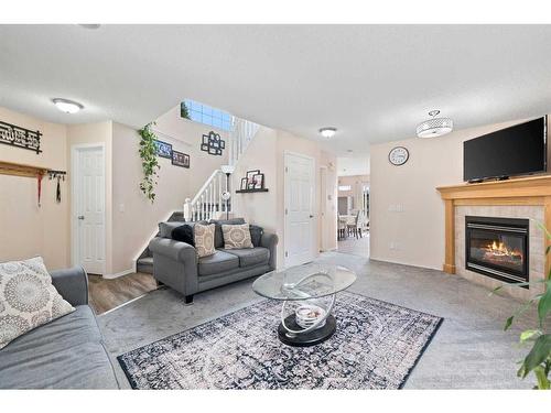 51 Tarington Way Ne, Calgary, AB - Indoor Photo Showing Living Room With Fireplace