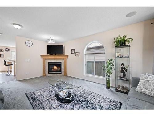 51 Tarington Way Ne, Calgary, AB - Indoor Photo Showing Living Room With Fireplace