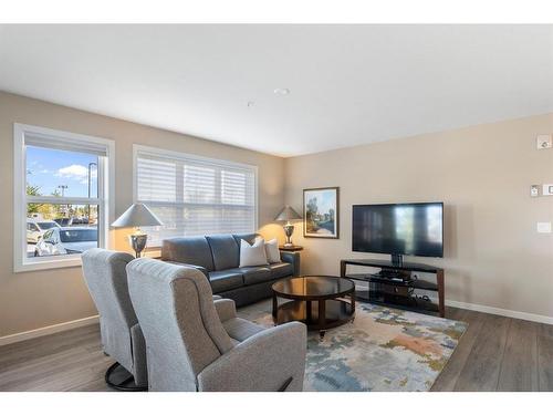 2111-10 Market Boulevard Se, Airdrie, AB - Indoor Photo Showing Living Room