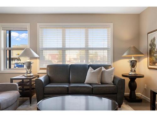 2111-10 Market Boulevard Se, Airdrie, AB - Indoor Photo Showing Living Room