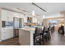 2111-10 Market Boulevard Se, Airdrie, AB  - Indoor Photo Showing Kitchen With Stainless Steel Kitchen With Upgraded Kitchen 