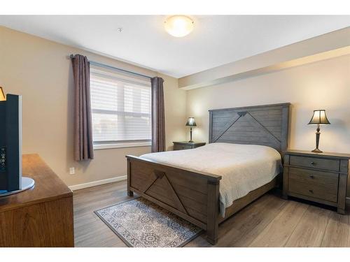 2111-10 Market Boulevard Se, Airdrie, AB - Indoor Photo Showing Bedroom