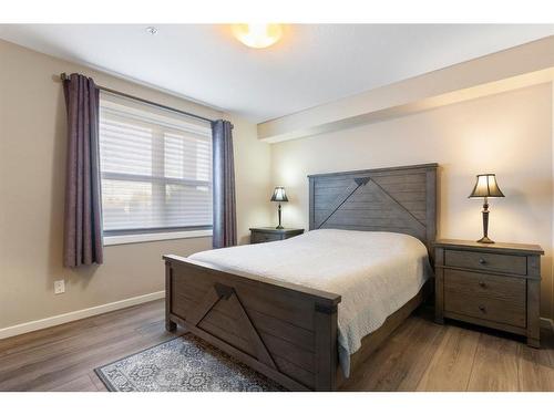 2111-10 Market Boulevard Se, Airdrie, AB - Indoor Photo Showing Bedroom