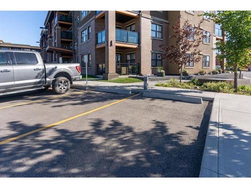 2111-10 Market Boulevard Se, Airdrie, AB - Outdoor With Balcony With Facade