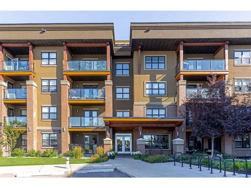 2111-10 Market Boulevard Se, Airdrie, AB - Outdoor With Balcony With Facade