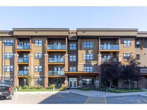 2111-10 Market Boulevard Se, Airdrie, AB - Outdoor With Balcony With Facade