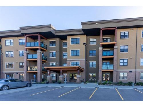 2111-10 Market Boulevard Se, Airdrie, AB - Outdoor With Balcony With Facade