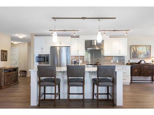 2111-10 Market Boulevard Se, Airdrie, AB - Indoor Photo Showing Kitchen With Stainless Steel Kitchen With Upgraded Kitchen