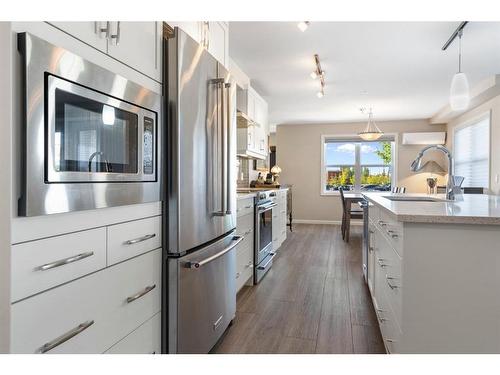 2111-10 Market Boulevard Se, Airdrie, AB - Indoor Photo Showing Kitchen With Stainless Steel Kitchen With Upgraded Kitchen