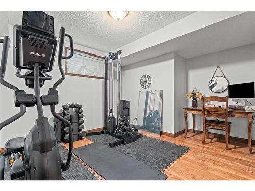 184 West Creek Landing, Chestermere, AB - Indoor Photo Showing Gym Room