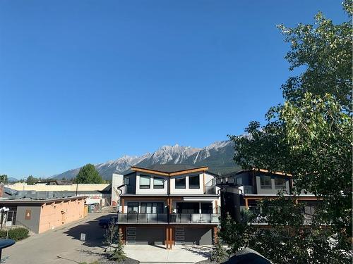 1-825 7Th Street North, Canmore, AB - Outdoor With Deck Patio Veranda With Facade