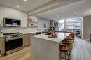 1-825 7Th Street North, Canmore, AB  - Indoor Photo Showing Kitchen 