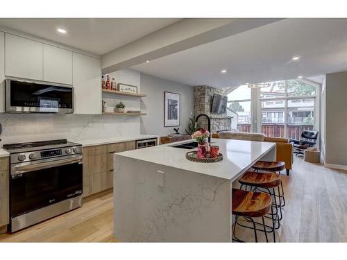 1-825 7Th Street North, Canmore, AB - Indoor Photo Showing Kitchen With Double Sink With Upgraded Kitchen