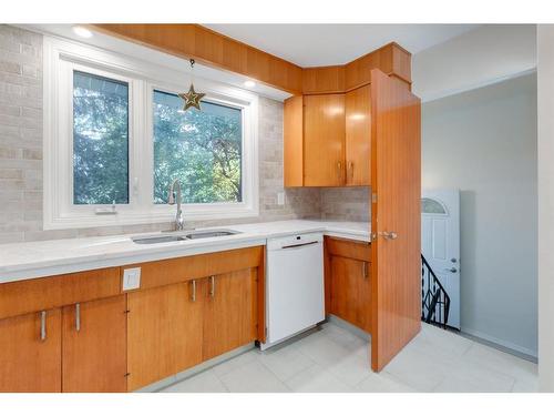 3412 Button Road Nw, Calgary, AB - Indoor Photo Showing Kitchen With Double Sink