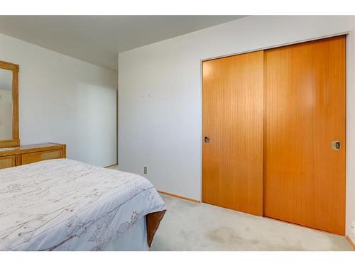 3412 Button Road Nw, Calgary, AB - Indoor Photo Showing Bedroom