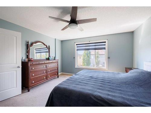 2033 Luxstone Link Sw, Airdrie, AB - Indoor Photo Showing Bedroom