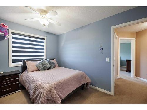 2033 Luxstone Link Sw, Airdrie, AB - Indoor Photo Showing Bedroom