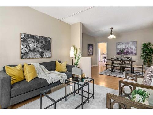 1418 11 Avenue Se, Calgary, AB - Indoor Photo Showing Living Room