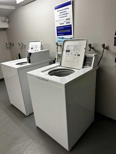 104-505 19 Avenue Sw, Calgary, AB - Indoor Photo Showing Laundry Room