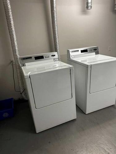 104-505 19 Avenue Sw, Calgary, AB - Indoor Photo Showing Laundry Room