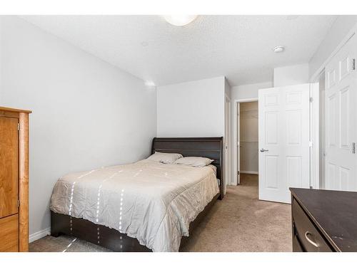 316 Windford Green Sw, Airdrie, AB - Indoor Photo Showing Bedroom