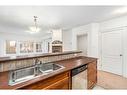 118-30 Discovery Ridge Close Sw, Calgary, AB  - Indoor Photo Showing Kitchen With Double Sink 