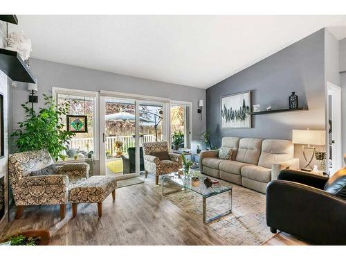 4B Centre Street, Strathmore, AB - Indoor Photo Showing Living Room With Fireplace