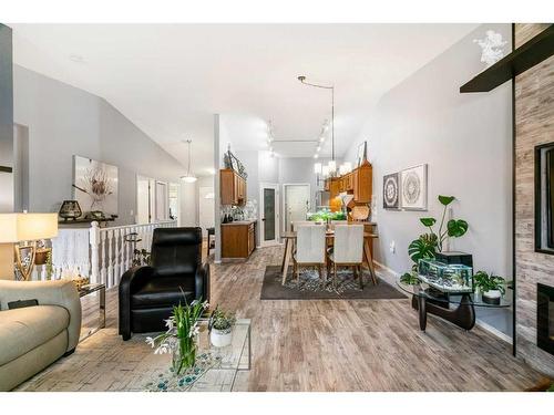 4B Centre Street, Strathmore, AB - Indoor Photo Showing Living Room With Fireplace