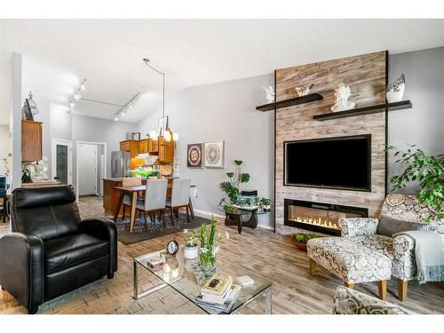 4B Centre Street, Strathmore, AB - Indoor Photo Showing Living Room With Fireplace