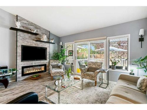 4B Centre Street, Strathmore, AB - Indoor Photo Showing Living Room With Fireplace