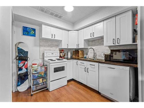 2-2804 17 Avenue Sw, Calgary, AB - Indoor Photo Showing Kitchen With Double Sink