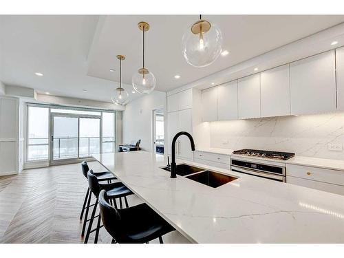 510-8505 Broadcast Avenue Sw, Calgary, AB - Indoor Photo Showing Kitchen With Double Sink With Upgraded Kitchen