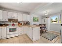 163 Woodvale Bay Sw, Calgary, AB  - Indoor Photo Showing Kitchen 