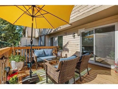 163 Woodvale Bay Sw, Calgary, AB - Outdoor With Deck Patio Veranda With Exterior