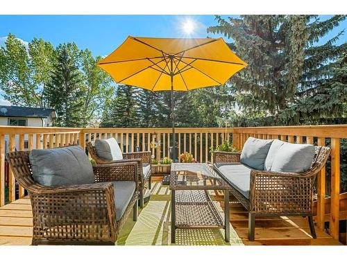 163 Woodvale Bay Sw, Calgary, AB - Outdoor With Deck Patio Veranda With Exterior