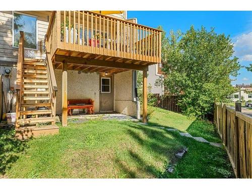 163 Woodvale Bay Sw, Calgary, AB - Outdoor With Balcony