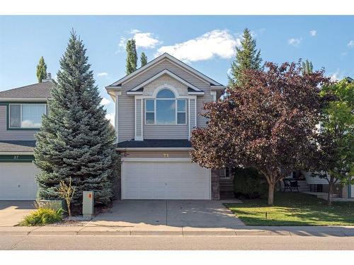 23 River Rock Place Se, Calgary, AB - Outdoor With Facade