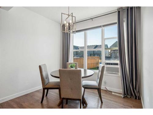 544 Belmont Heath Sw, Calgary, AB - Indoor Photo Showing Dining Room