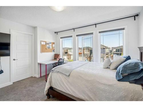 544 Belmont Heath Sw, Calgary, AB - Indoor Photo Showing Bedroom