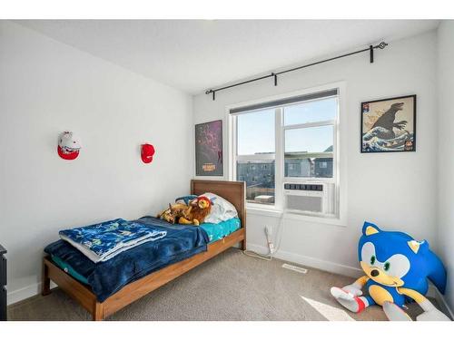 544 Belmont Heath Sw, Calgary, AB - Indoor Photo Showing Bedroom