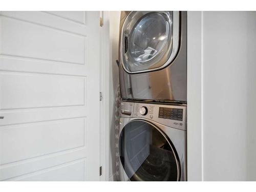 544 Belmont Heath Sw, Calgary, AB - Indoor Photo Showing Laundry Room