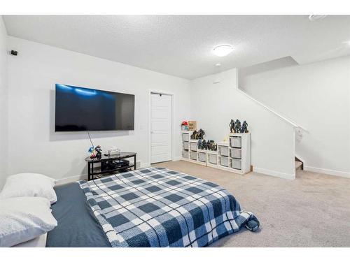 544 Belmont Heath Sw, Calgary, AB - Indoor Photo Showing Bedroom