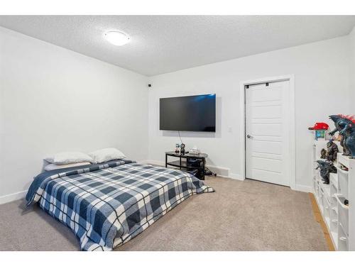 544 Belmont Heath Sw, Calgary, AB - Indoor Photo Showing Bedroom