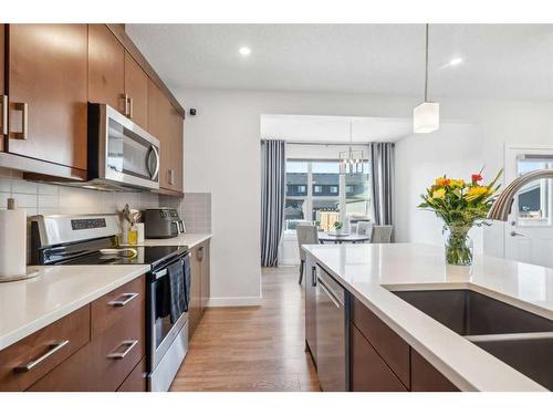 544 Belmont Heath Sw, Calgary, AB - Indoor Photo Showing Kitchen With Stainless Steel Kitchen With Upgraded Kitchen