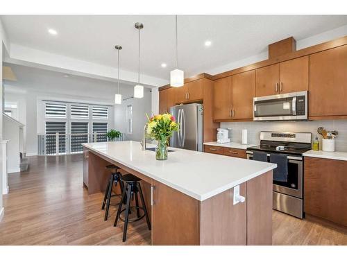 544 Belmont Heath Sw, Calgary, AB - Indoor Photo Showing Kitchen With Stainless Steel Kitchen With Upgraded Kitchen