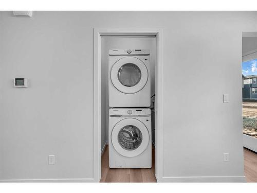 160 Setonstone Manor Se, Calgary, AB - Indoor Photo Showing Laundry Room