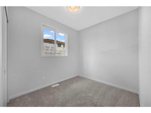 160 Setonstone Manor Se, Calgary, AB - Indoor Photo Showing Other Room