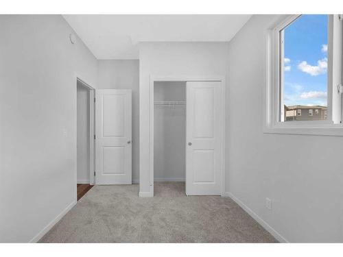 160 Setonstone Manor Se, Calgary, AB - Indoor Photo Showing Other Room