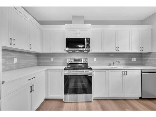 160 Setonstone Manor Se, Calgary, AB - Indoor Photo Showing Kitchen