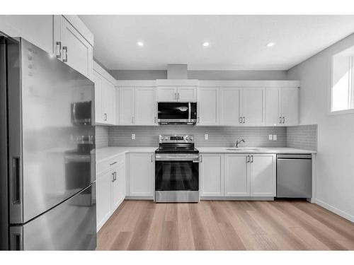 160 Setonstone Manor Se, Calgary, AB - Indoor Photo Showing Kitchen